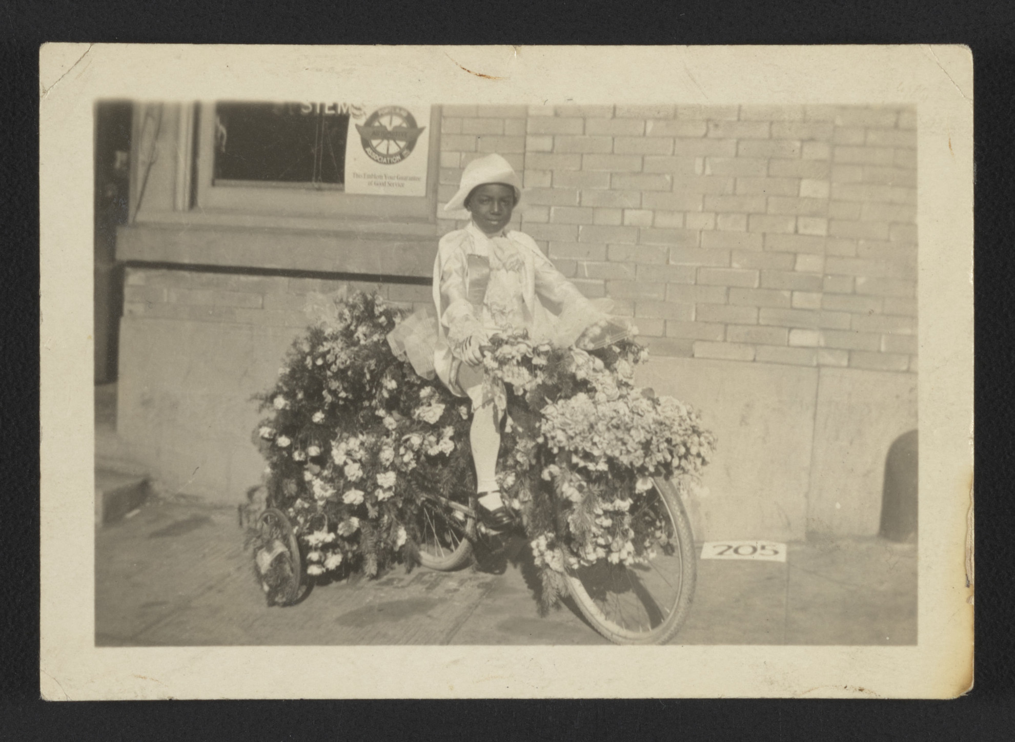 George Cannady on decorated bicycle