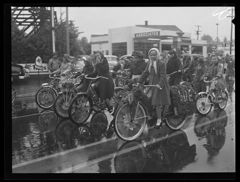 Children riding decorated bikes